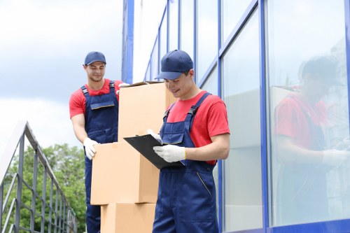 Staff checking storage area safety standards
