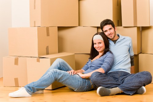 Fulham business relocation with movers handling office furniture in a London street