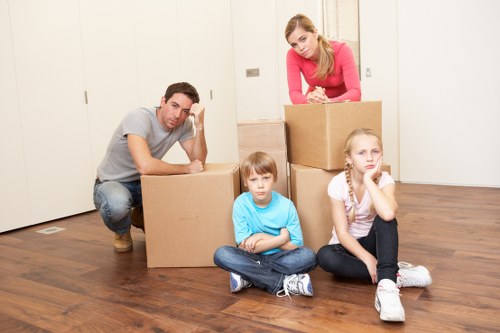 Movers handling boxes and bulky items for a Fulham relocation